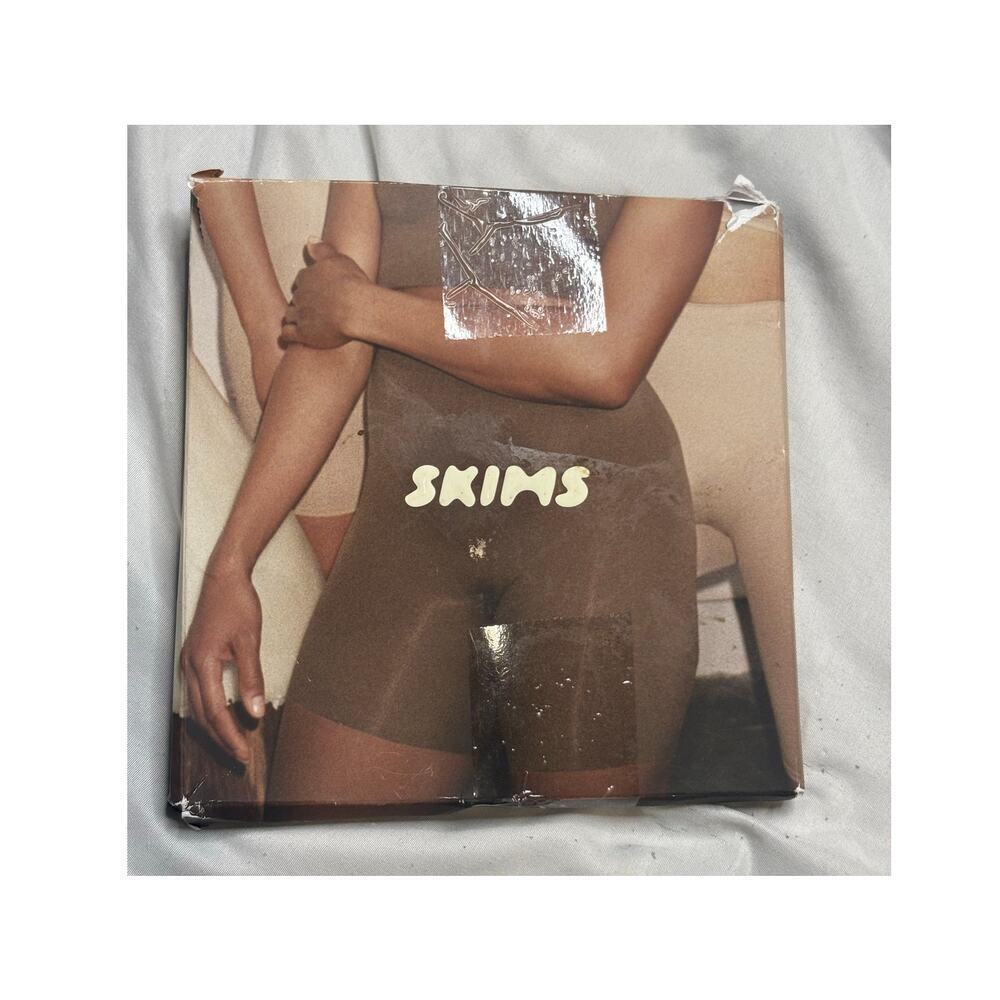 SKIMS Seamless Sculpting Short Above Knee in Ochre SZ L/XL